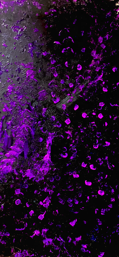 close up art pattern, black with bright purple splotches 